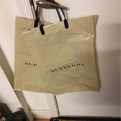 (2) Burberry Shop Bags https://offerup.com/redirect/?o=TWVkLk5ldw==