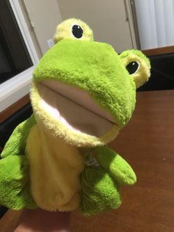 Frog puppet makes croak sounds