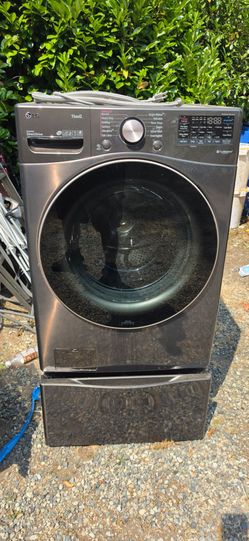 LG ThinQ Front Load Washing Machine with Pedestal and dryer