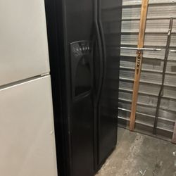 Black refrigerator no icemaker in the water but works great we sell all the time will deliver for an extra fee