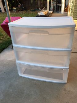 The plastic organizer with 3 drawers. Long 21 inches 1/2 width 15 inches height 24 inches