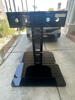 Black Glass TV Stand / Entertainment Center – Good Condition