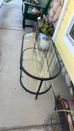 Glass and metal coffee table