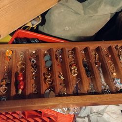 Assortment Of Earrings, Rings, And Pins