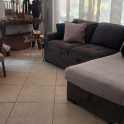 Convertible Sleeper Sectional with Storage & Chair.