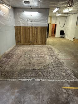 Old Big Rug 12 Feet By 17 Feet As Is Needs To Be Cleaned