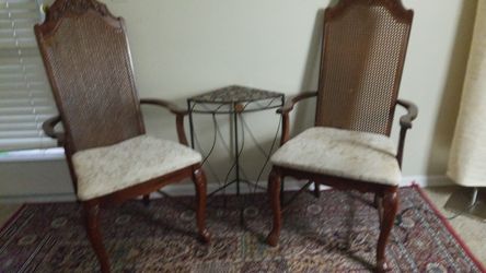 2 chairs with metal table