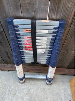 Extend and Climb telescoping ladder. 785p