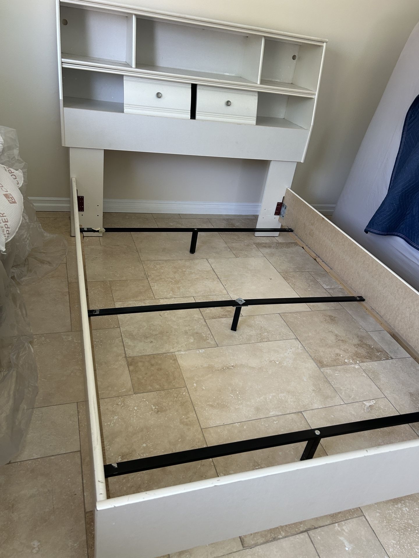 bed frame with a bookshelf 