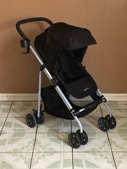 PRACTICALLY NEW EVENFLO REVERSI STROLLER AND BASSINET!!!!