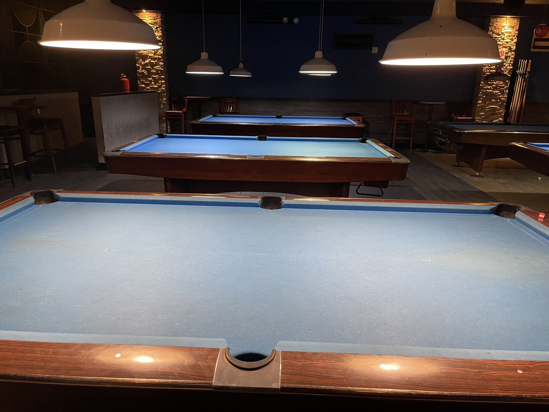 Three Pool Tables