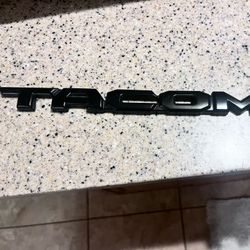 Tacoma Emblem Black Out Covers (OEM)