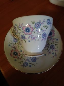 Cup and saucer blue blossom fine bone china 1974 Avon