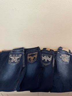 Pantalones acampanados con bolsas con diseños talla 3 $10 cada uno