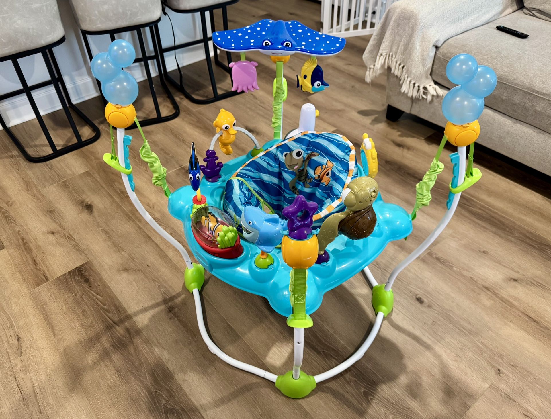 Baby Jumper — Bright Starts Disney Baby Finding Nemo Sea of Activities Baby Activity Center Jumper with Interactive Toys, Lights, Songs & Sounds, 6-12