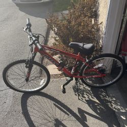 Red Huffy Bike