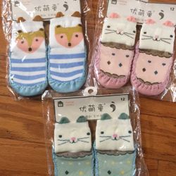 NWT baby sock shoes 3 pairs size 9-12m