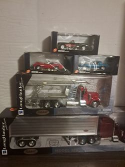 Toy Lot Some New diecast cars & trucks & new barbie car with barbie and some vintage barbies & army men action figures all as lot