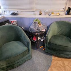 2 Swivel Accent Chairs