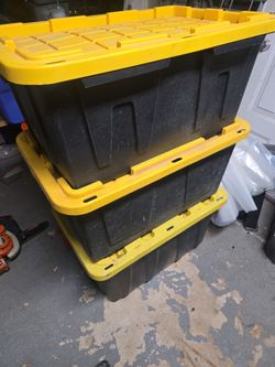 3 totes full of clothes