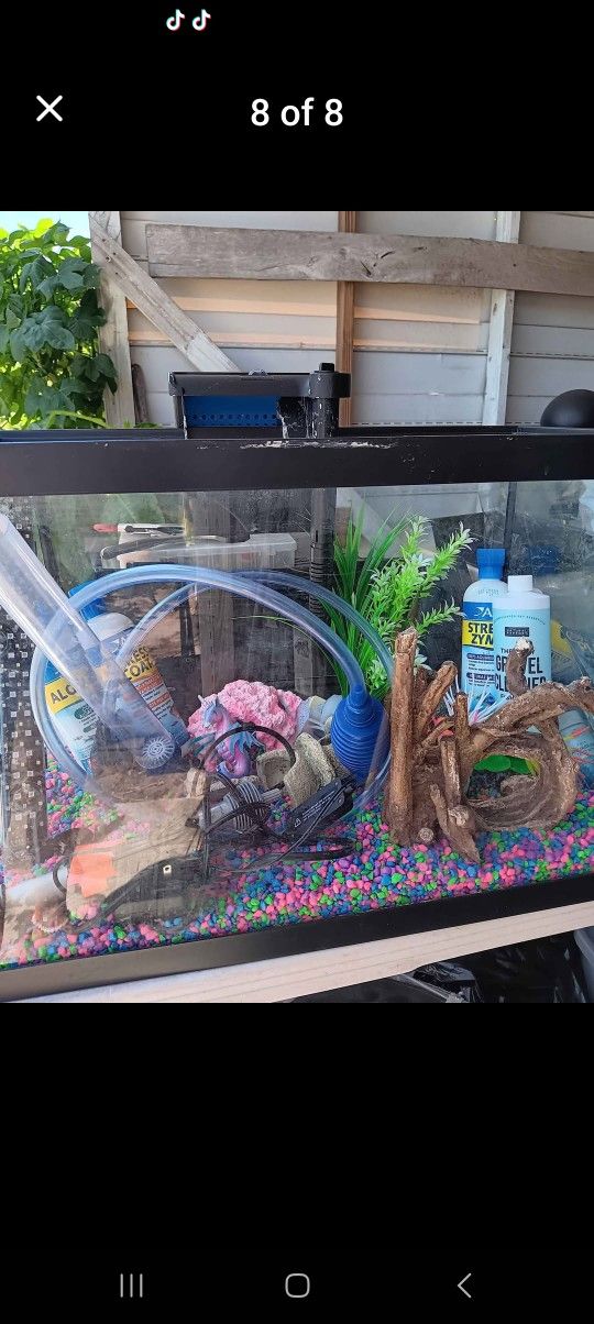 FISH AQUARIUM WITH TONS OF ACCESSORIES