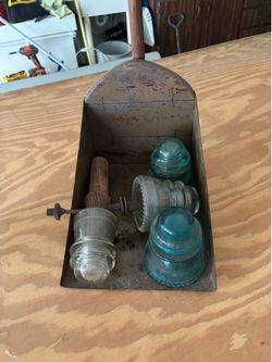 Vintage Long Handle Dust Pan filled with Insulators