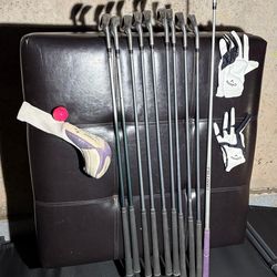 Set of golf clubs.  Tour Edge Lady Edge 3-Wood from a women's complete set.  Club Type: 3-Wood fairway club designed for women.  Titleist brand golf c