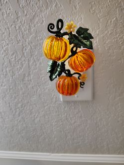 Bath & Body Works three pumpkin-shaped wall lamp.