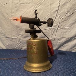 Antique torch turned into desk light