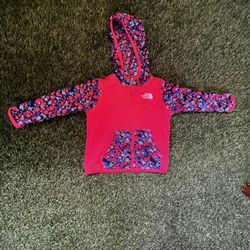 The North Face hooded fleece pink jacket with flowers. 