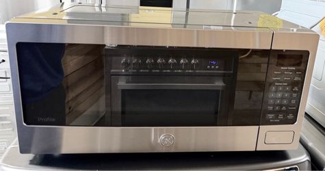 New 24” GE Profile Countertop Microwave Oven