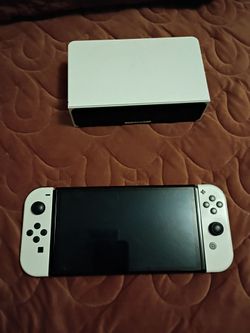 Nintendo switch oled with 128 gb SD card with box pick up only