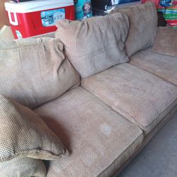 Light Brown Fabric Couch With Pillows 