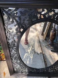 Black Wood Mirror with Intricate Wood Design 26” W x 32 H