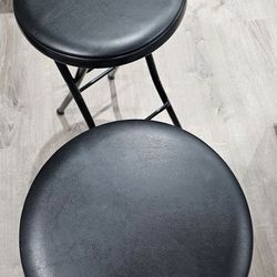 Barely used foldable cushioned high stool.