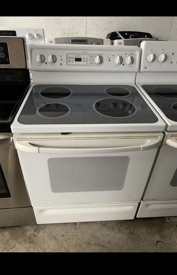 Ge white glass top stove / range / delivery available for Sale in Tampa, FL OfferUp