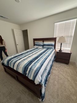 Dark solid Wood queen bed/ nightstand mattress included.