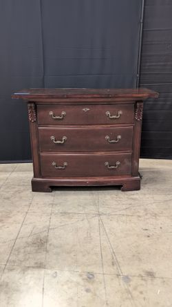 Thomasville Dark Wood Three-Drawer Dresser with Ornate Hardware