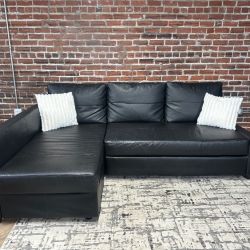 Delivery Available IKEA black leather sectional sofa couch