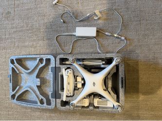 DJI Phantom 4 Drone Bundle – 2 Batteries, Case, Charger, Extra Props – Excellent Condition