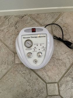 Vacuum therapy machine