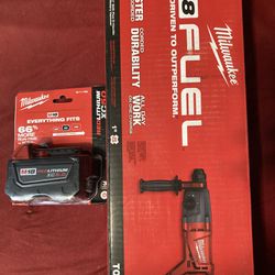 Milwaukee Hammer Drill And 5.0 Battery.