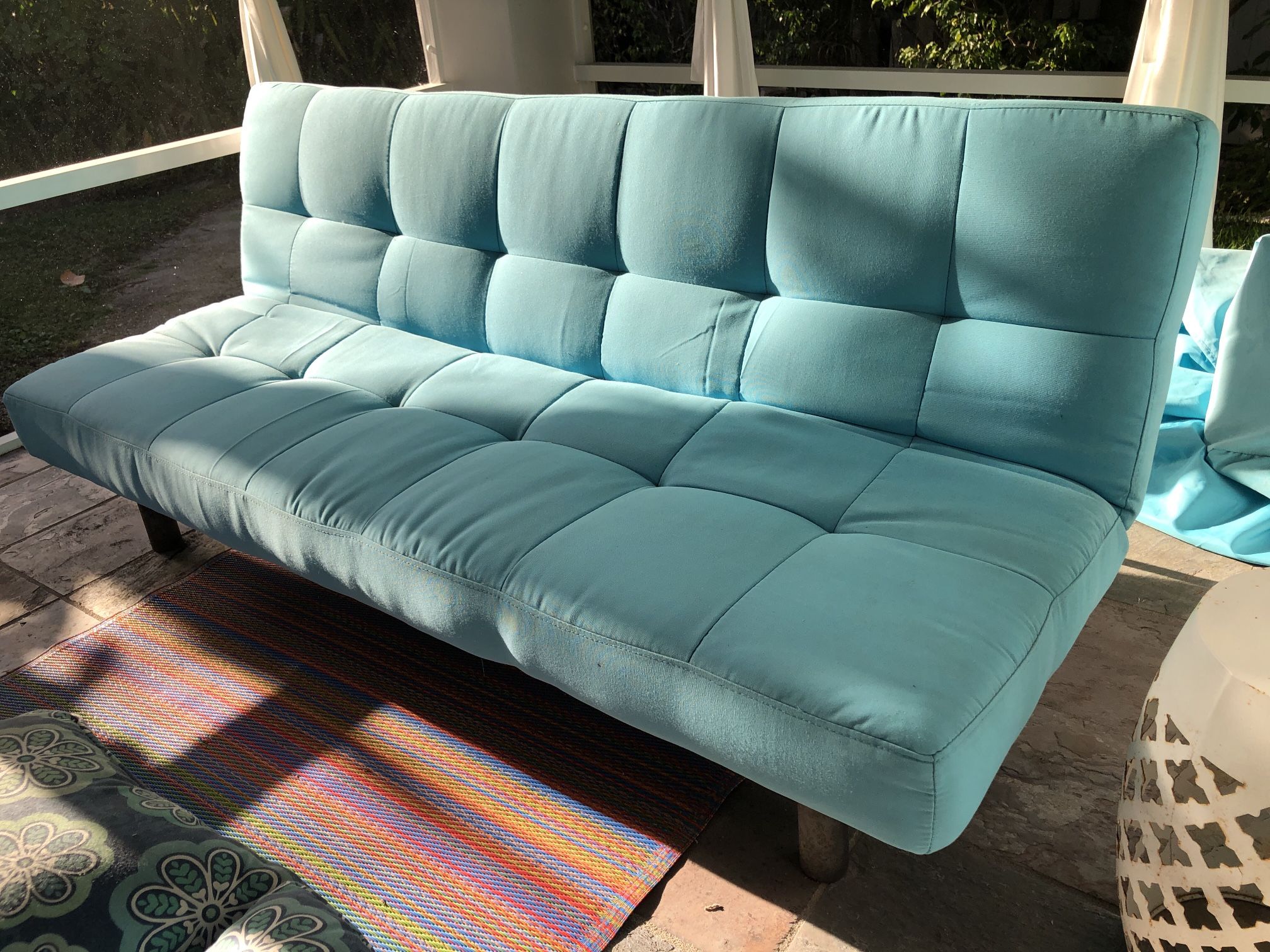A Serta Dream outdoor Convertible Sofa