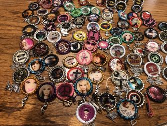 100 includes pin, rings, tacks, magnets and keychains NEW!