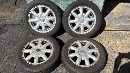 Mini Cooper 15x5.5 Inch stock Aluminum wheels with old tires 4x100mm