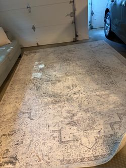 Distressed vintage style gray rug