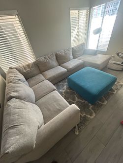 Large tan sectional couch