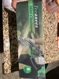 Mini chain saw brand new -89044 Henderson NV
