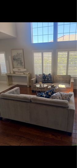2 grey couches