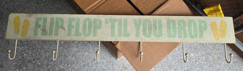 Free sign with hooks